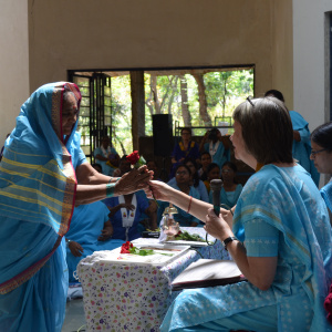 Receive offering from Dhni. Karunamaya