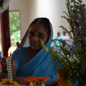 Dhni. Shantipriya placing offering to Shrine