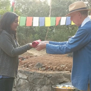 Sakshi offering Mahayana Robe