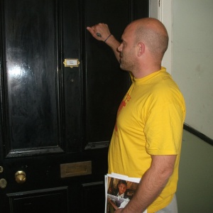 Mike knocks a door for the Edinburgh Karuna Appeal