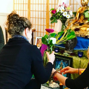 Meagan Offers Flowers