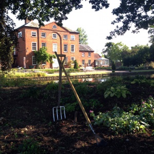 The main house with Sanghadeva's plantings